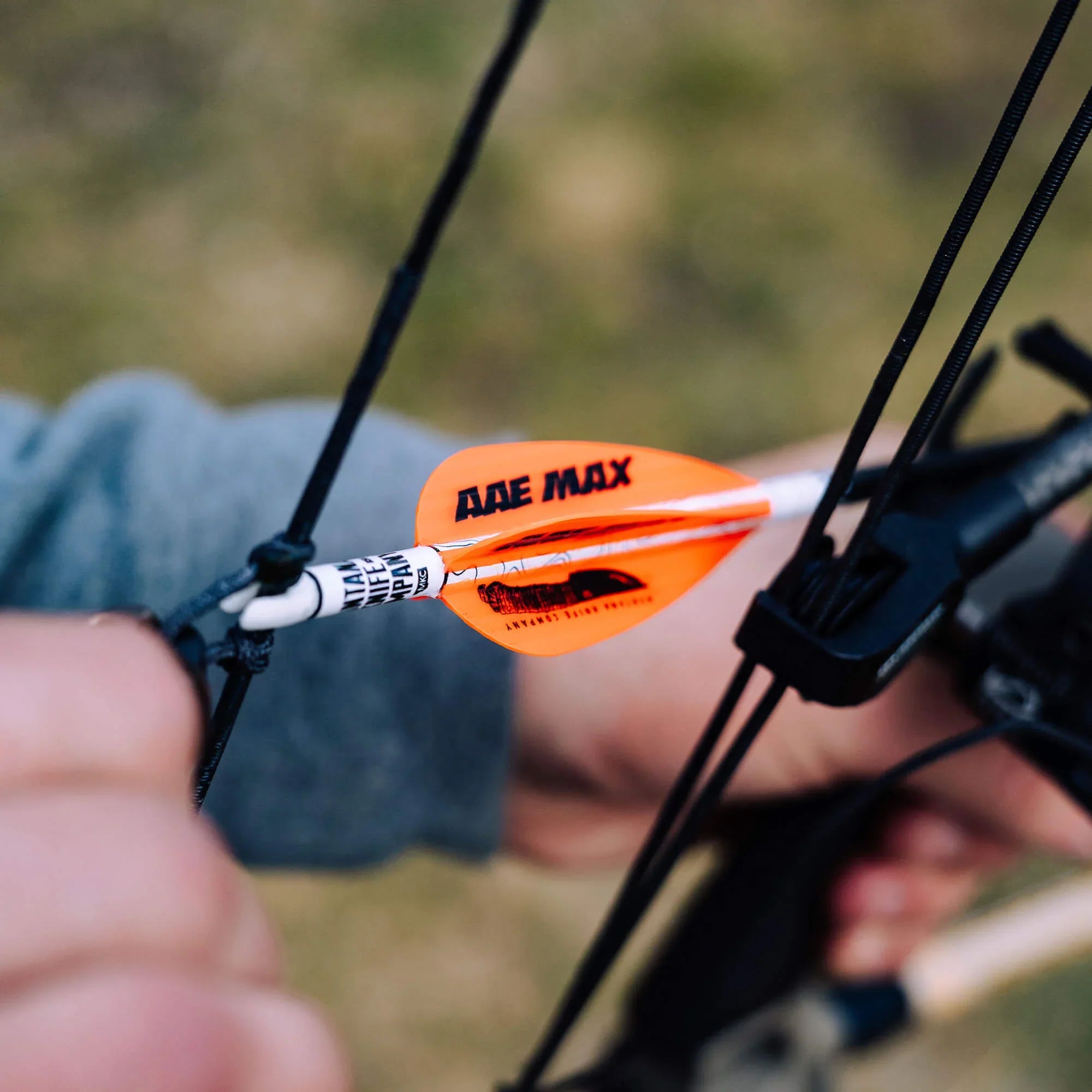 AAE Archery arrow-building supplies including adhesives, primers, lubricants, and fletching accessories for hunting and target archery