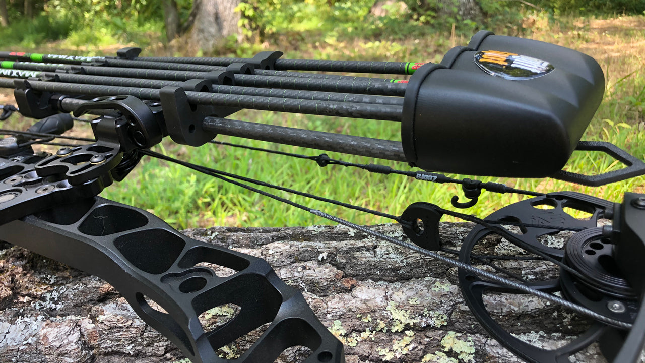 TightSpot Archery bow quiver mounted on a compound bow with hunting arrows for bowhunting and archery in Canada