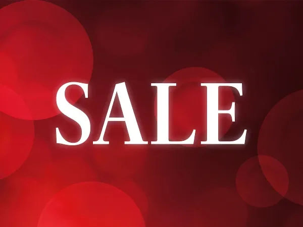 SALE text in white on a vibrant red background with bokeh circles, store sale banner