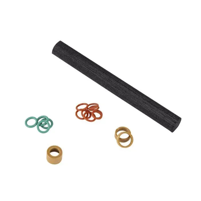 Air compressor maintenance kit with filter tube, O-rings, and seals on white background.