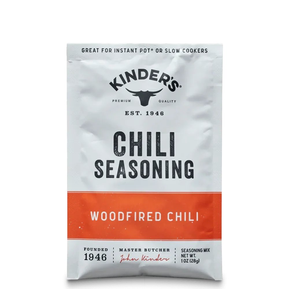 Packet of Kinder's woodfired chili seasoning mix for camping or outdoor cooking