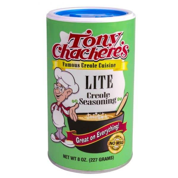 Tony Chachere's Lite Creole Seasoning 8oz can with green label and cartoon chef illustration.