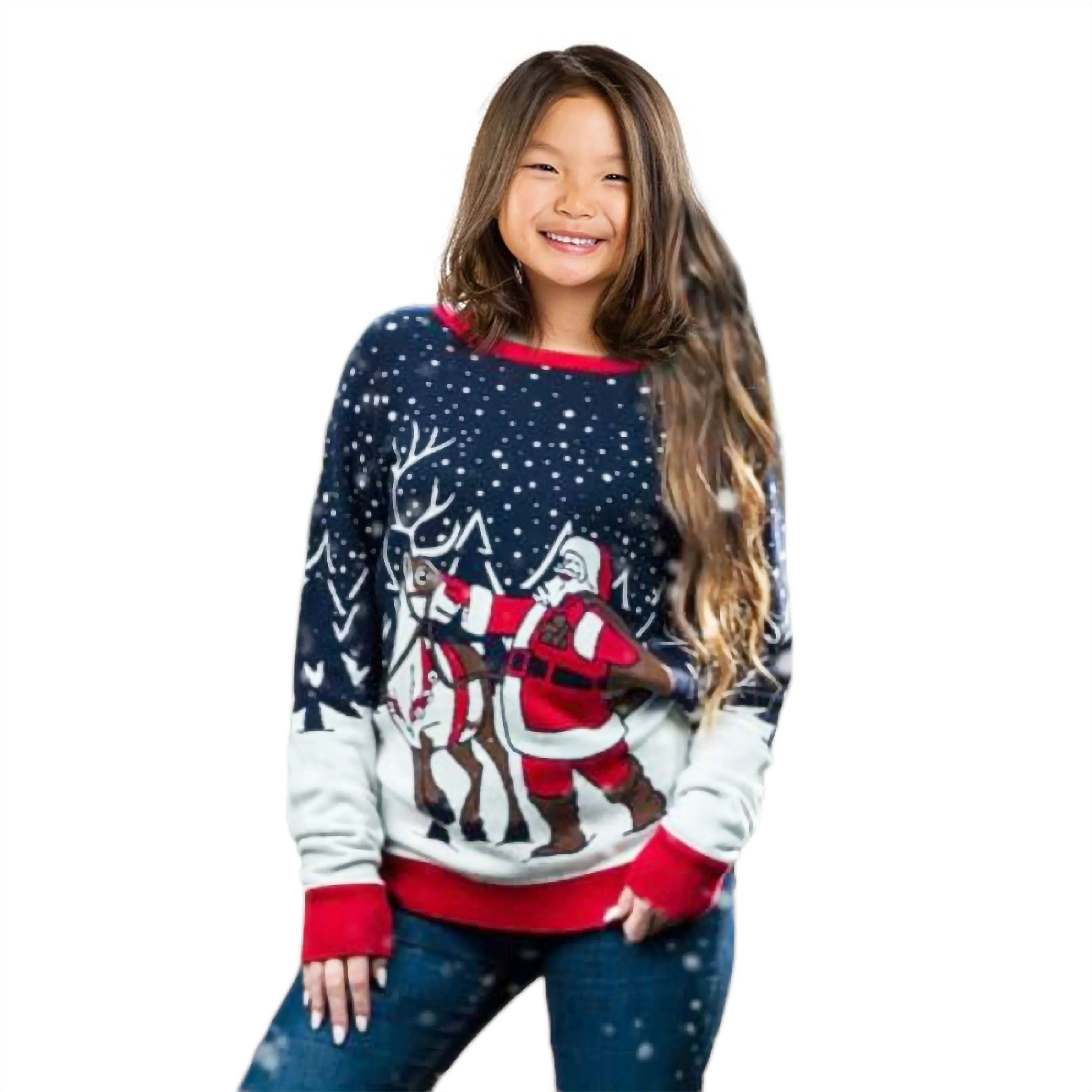 Smiling girl in blue Christmas sweater with Santa and reindeer snow scene