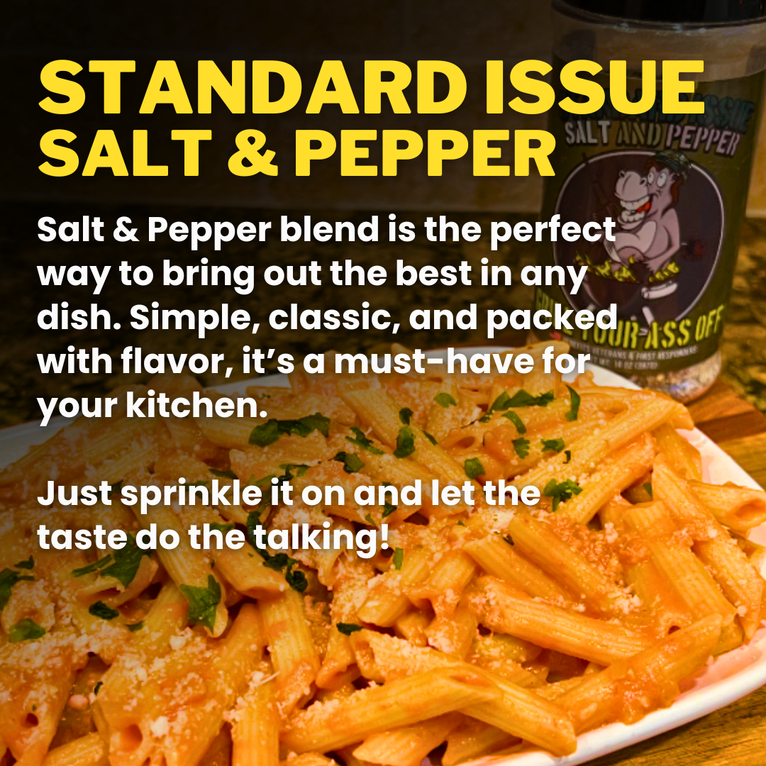Salt and pepper seasoning blend next to pasta dish, kitchen countertop setting