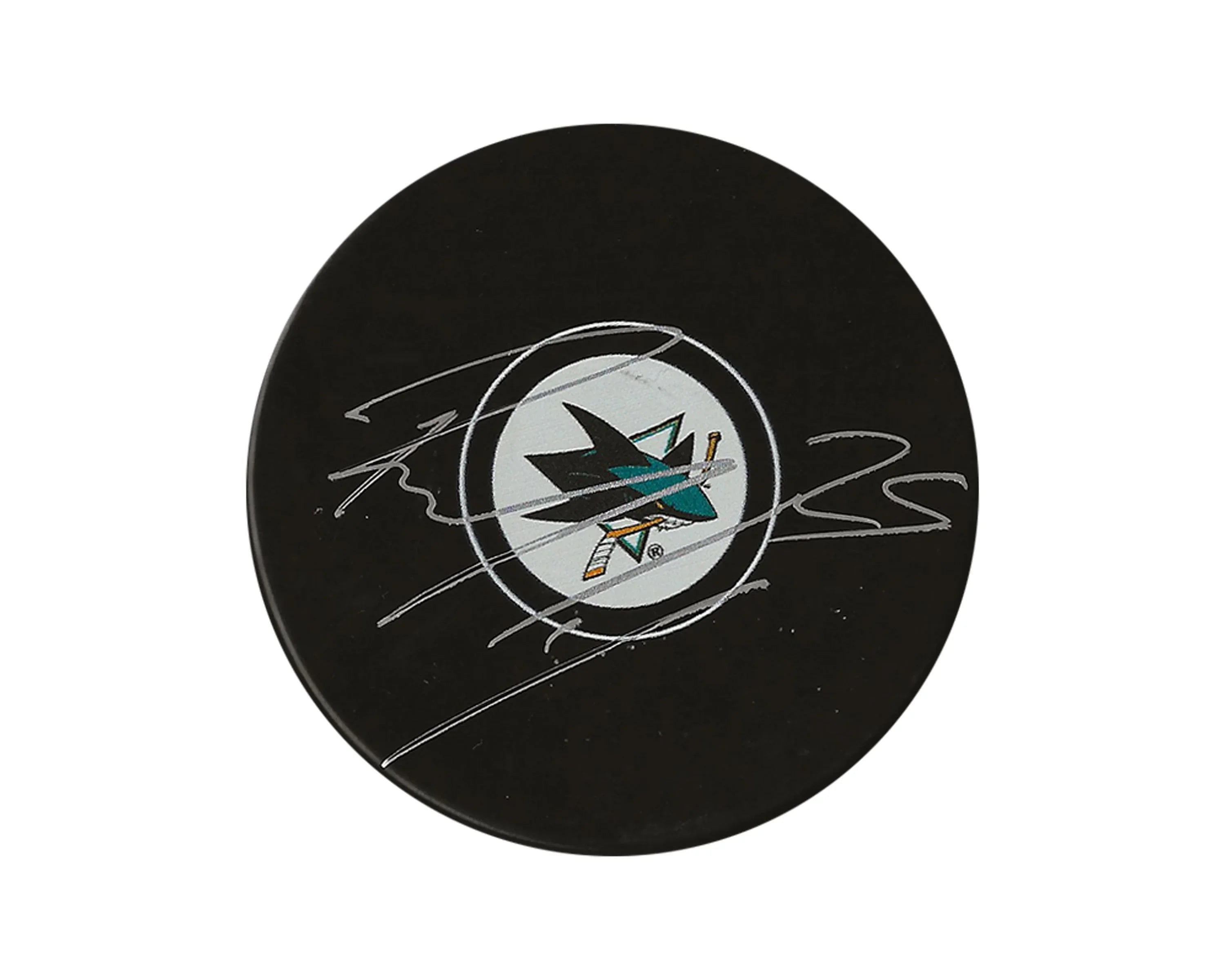 San Jose Sharks hockey puck with silver autograph, white and teal shark logo
