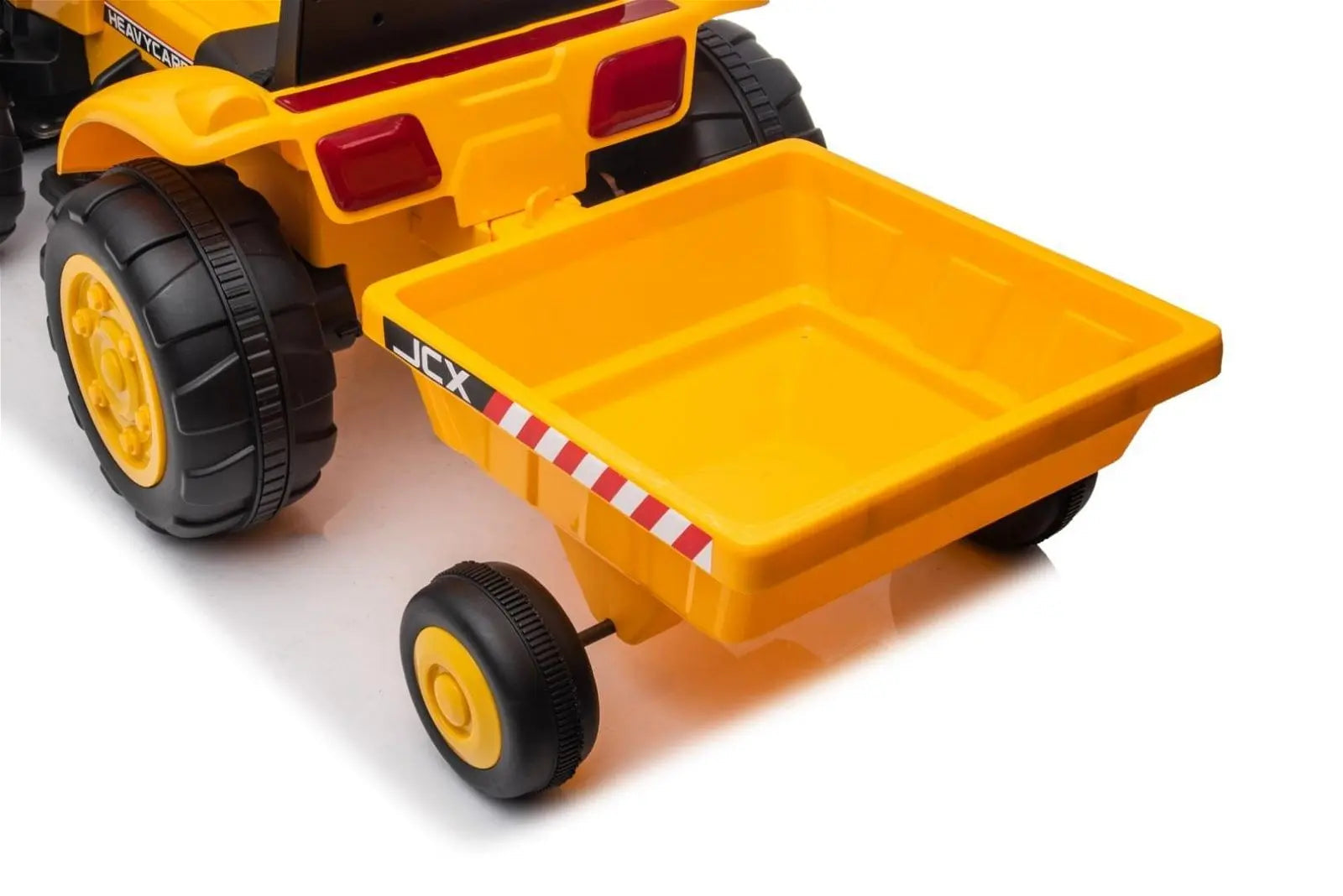Rear view of yellow toy ride-on excavator with large wheels and a dump bucket for kids