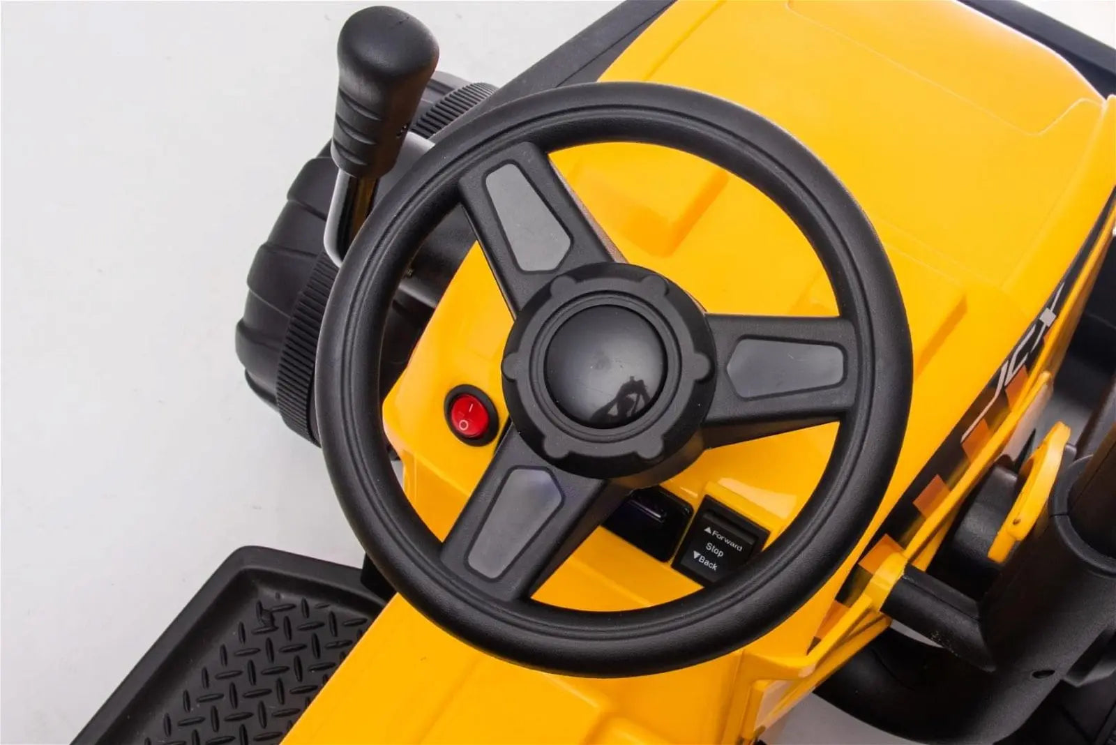 Close-up of yellow kids ride-on excavator steering wheel and control lever