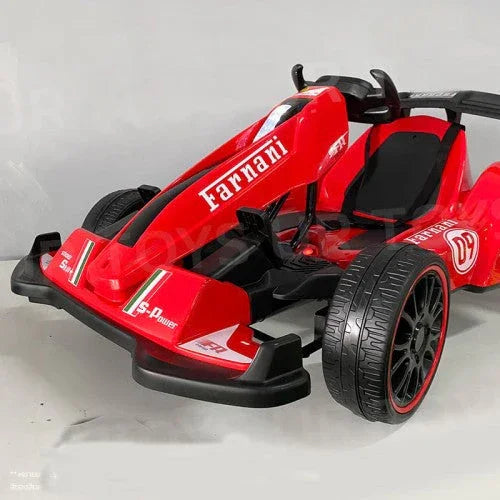 Red Farnani kids electric go kart with racing decals on a plain background