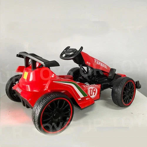 Red kids pedal go-kart with racing stripes and number 09, black seat and wheels