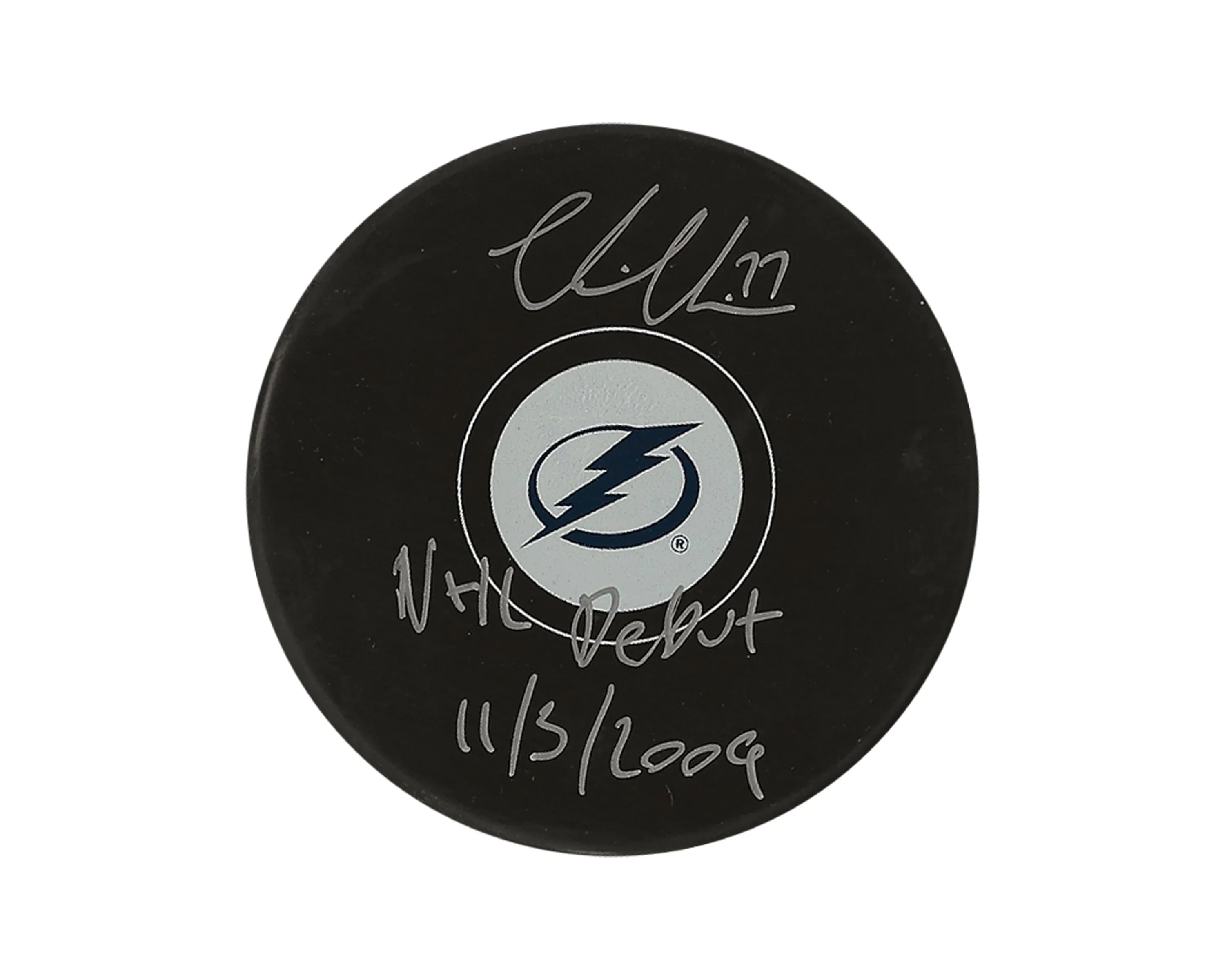 Signed hockey puck with Tampa Bay Lightning logo and NHL debut date.