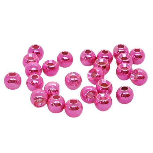 Shiny pink fishing beads for lures or fly tying, arranged on a white background