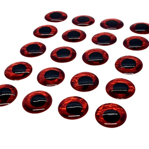 Set of glass lure eyes for fishing and fly tying, red with black center, on white background