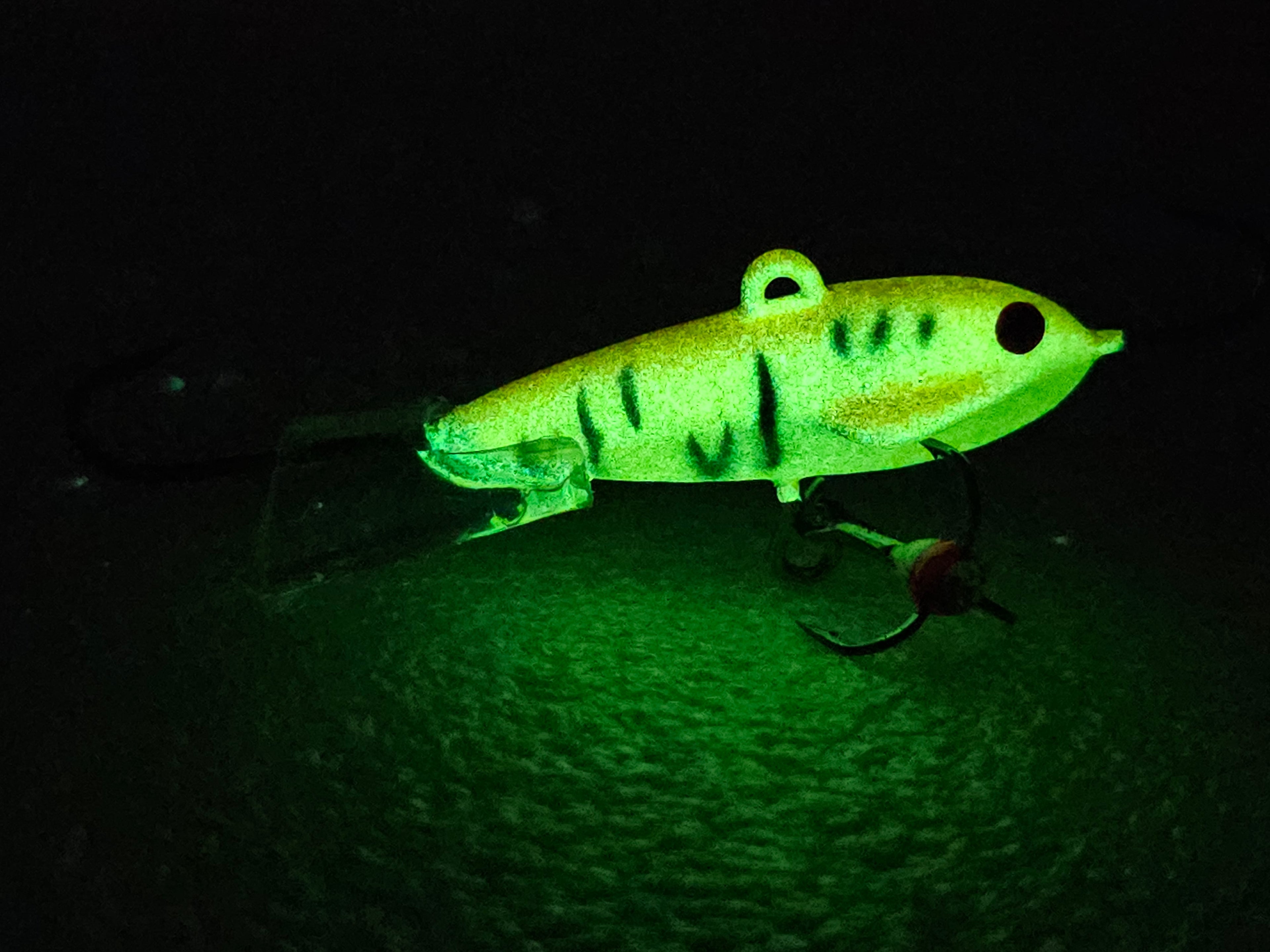 Glow in the dark fishing lure with treble hook for night fishing and ice fishing