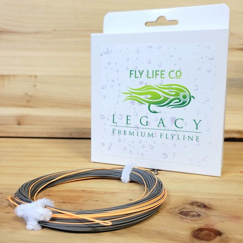 Fly Life Co Legacy Premium Flyline packaging with coiled fly fishing line on wood surface