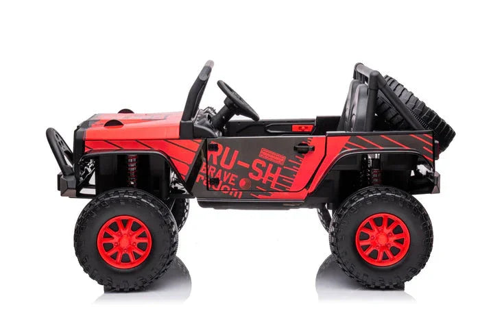 Red and black toy off-road jeep with large tires and open roof on white background