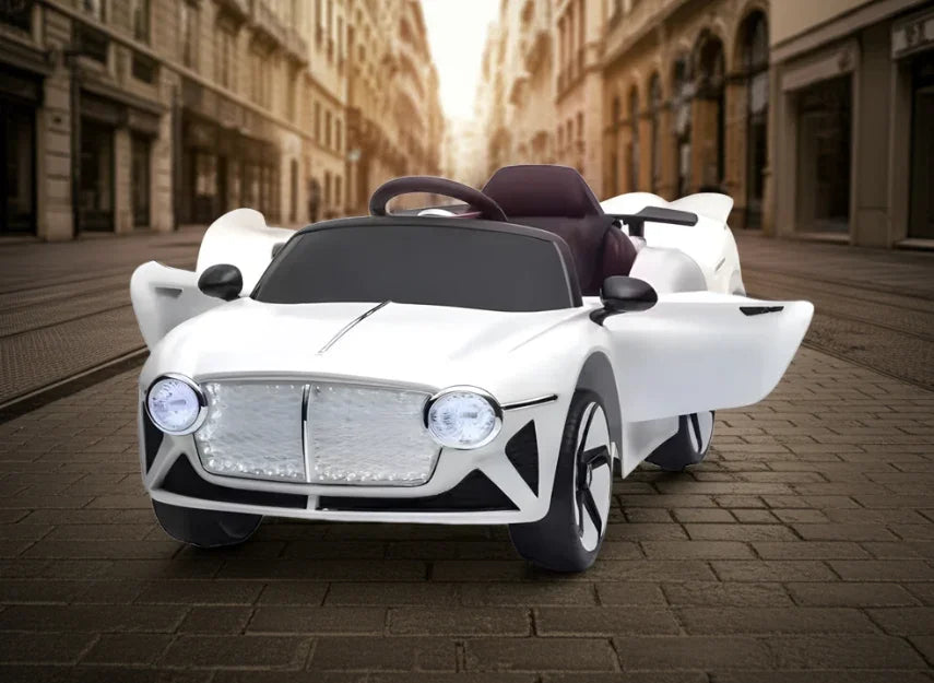 White kids electric ride-on car with open doors on a cobblestone street, city background