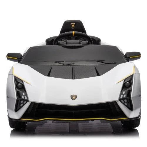 White Lamborghini kids ride-on car, black seat, yellow detailing, photographed from front
