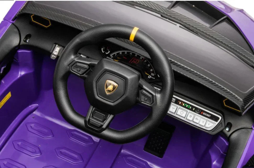 Purple Lamborghini toy car interior with steering wheel and dashboard controls