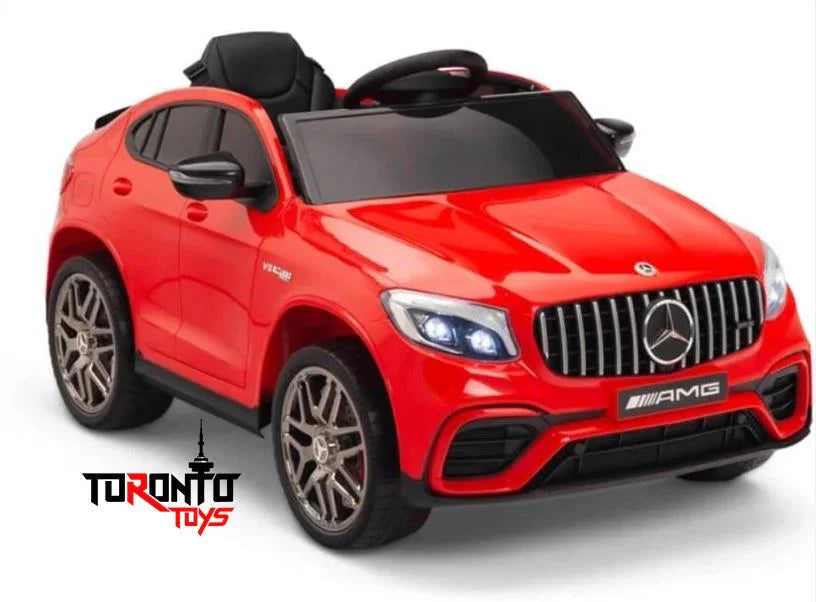 Red Mercedes AMG kids ride-on car toy with headlights, Toronto Toys logo in front