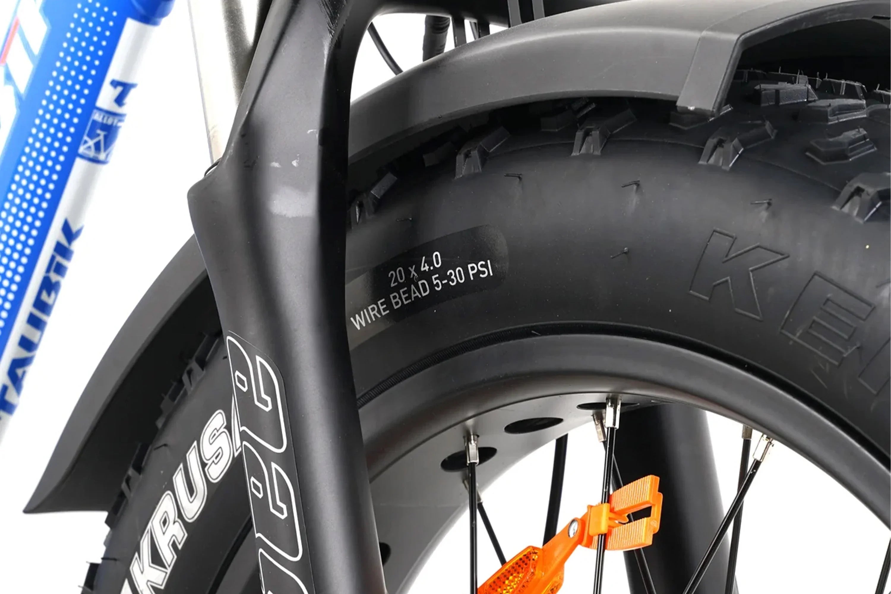Close-up of Taubik Escape foldable fat tire electric bike 20x4.0 wheel and fork detail