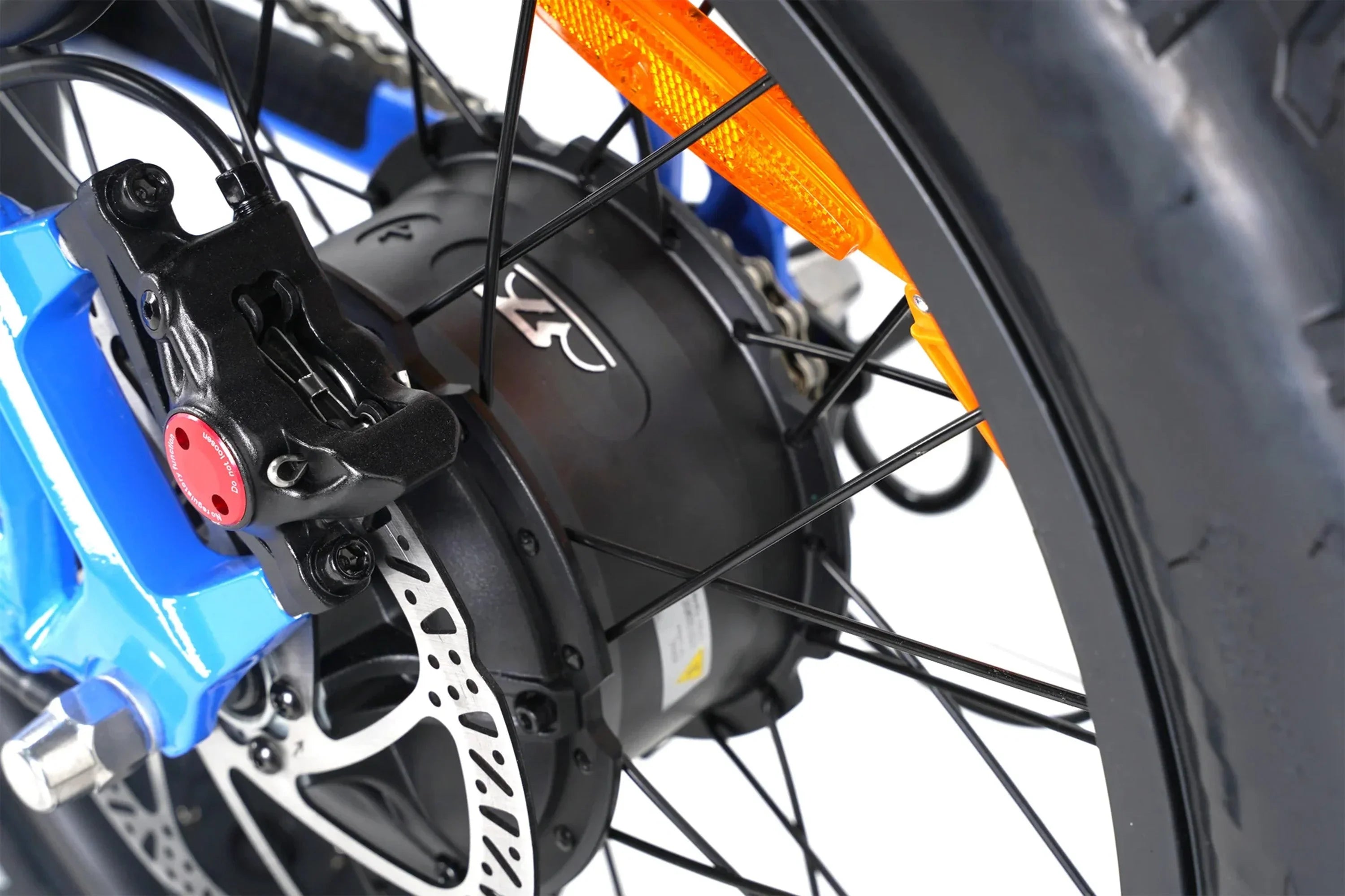 Close-up of Taubik Escape foldable fat tire e-bike rear wheel, disc brake, and hub motor