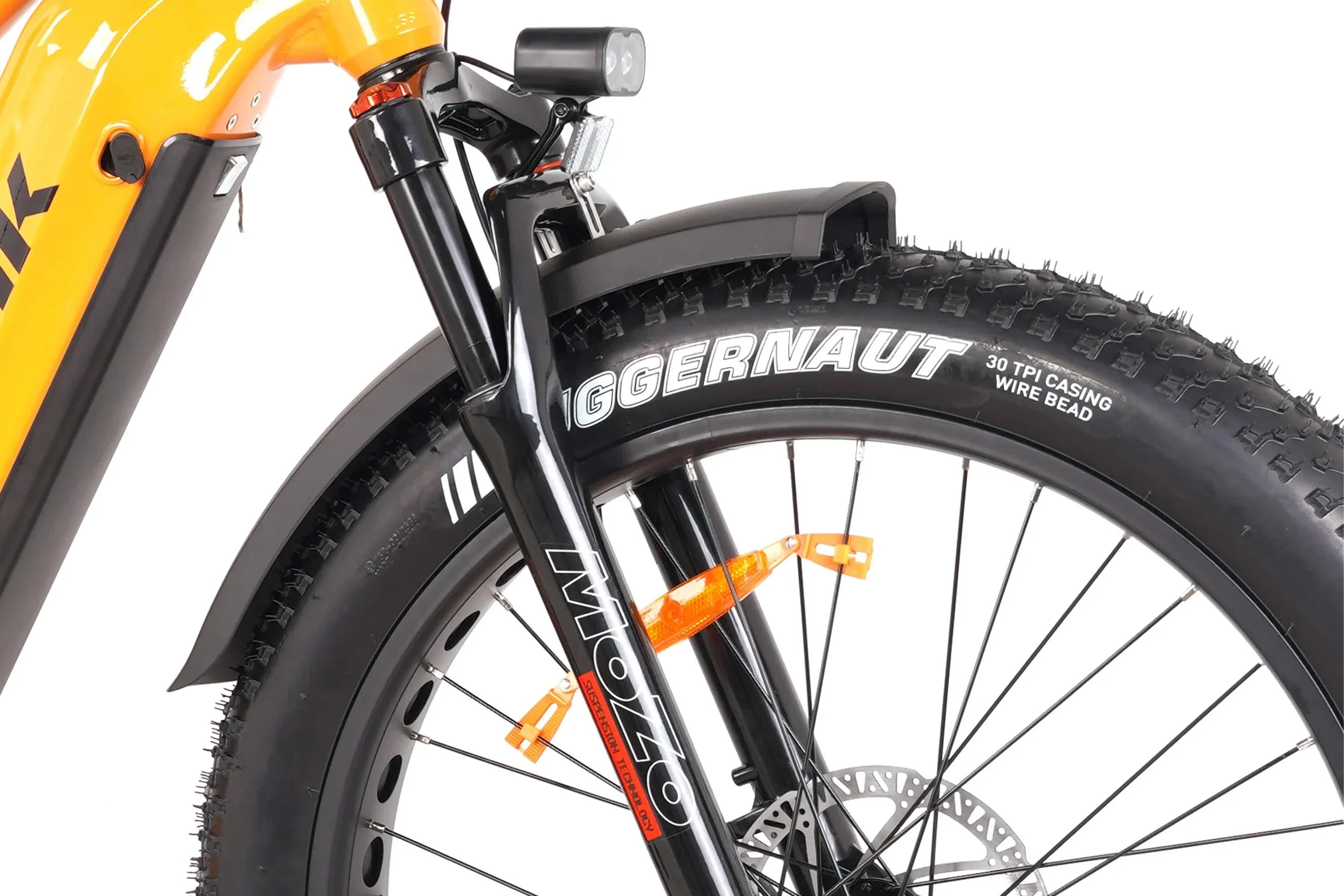Close-up of Taubik Westridge 4T off-road e-bike front suspension fork and fat tire