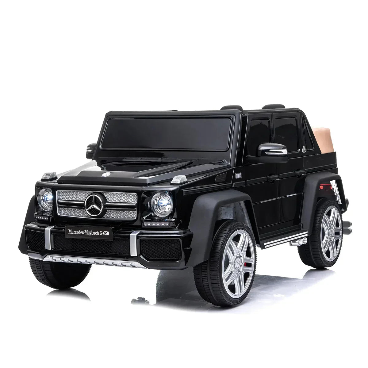 Black Mercedes-Maybach G650 ride-on toy car with chrome wheels on white background