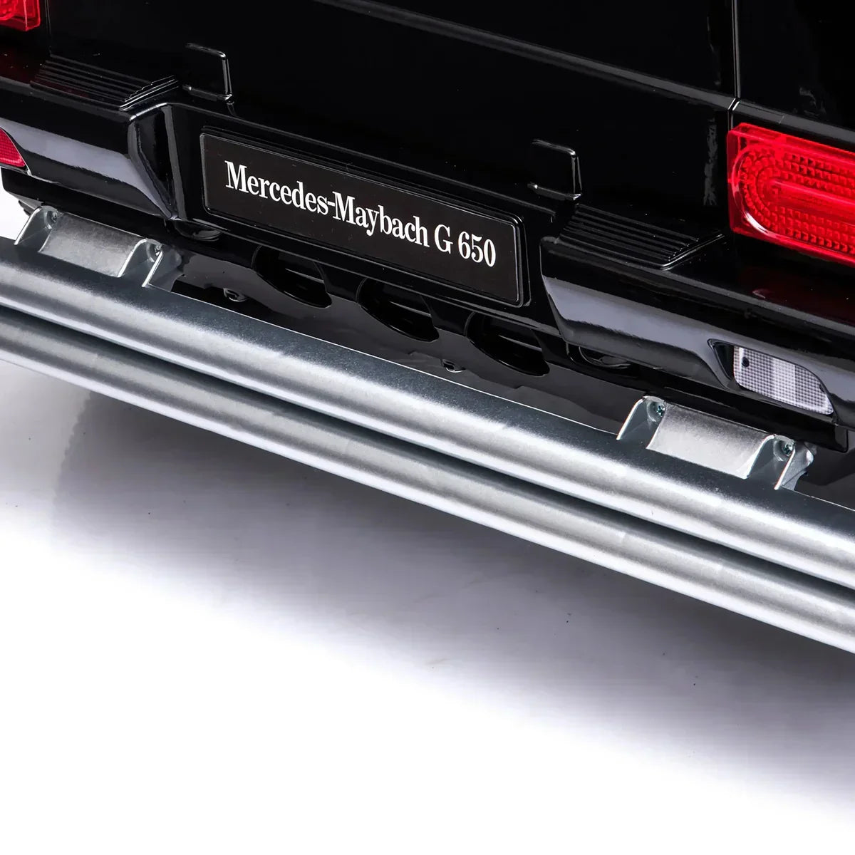 Close-up of Mercedes-Maybach G 650 rear bumper and license plate with red tail lights