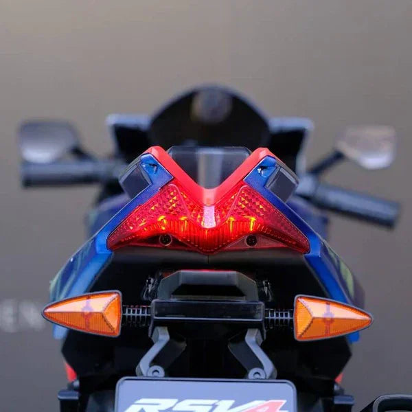Rear view of blue Aprilia motorcycle RSV4 with LED taillight and turn signals
