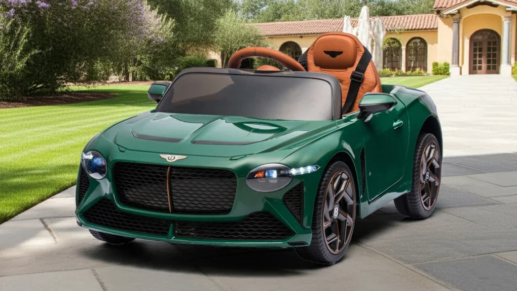 Green Bentley Bacalar 12V kids ride-on car with brown seat, parked outdoors on a driveway