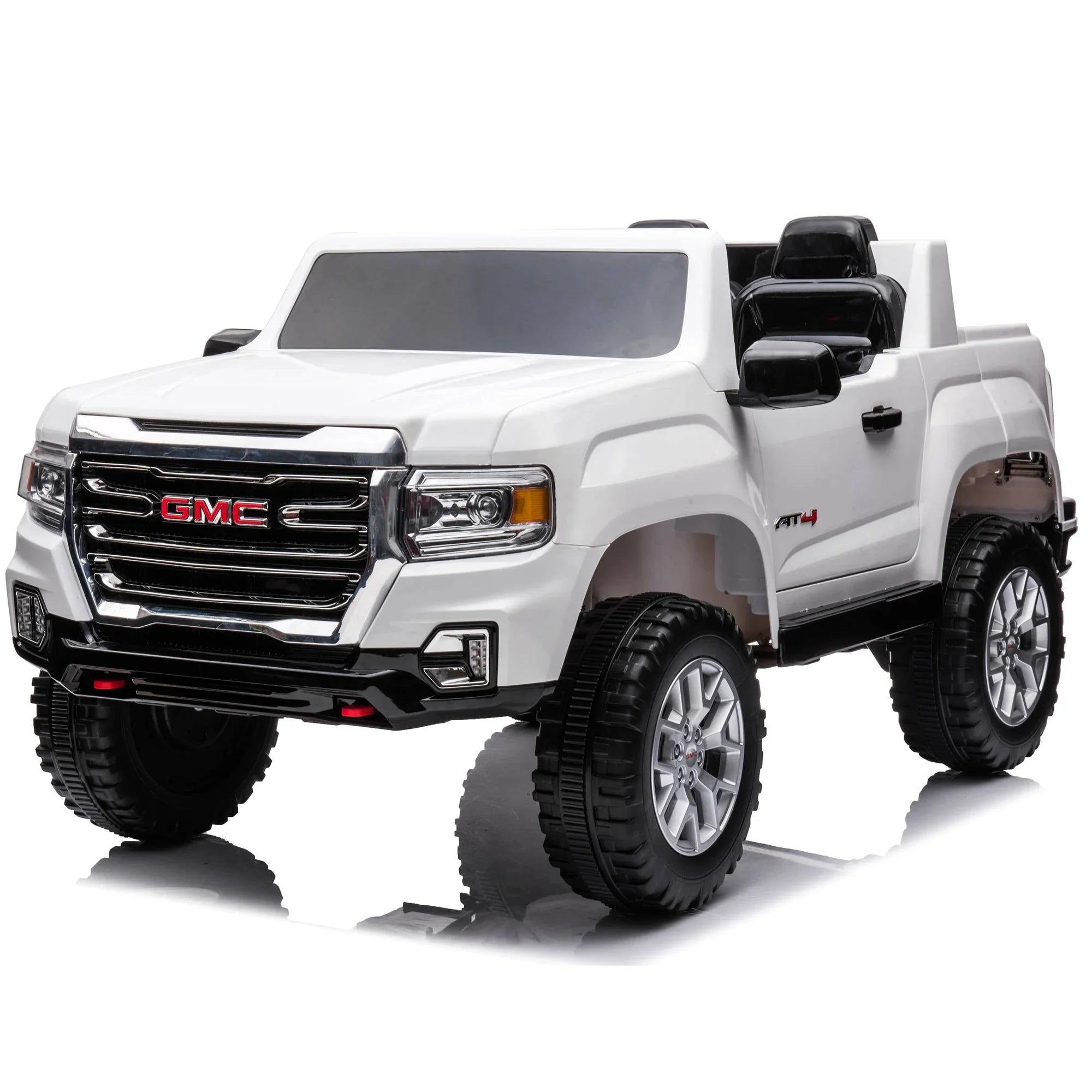 White GMC AT4 kids ride-on truck toy with black seats and detailed front grille