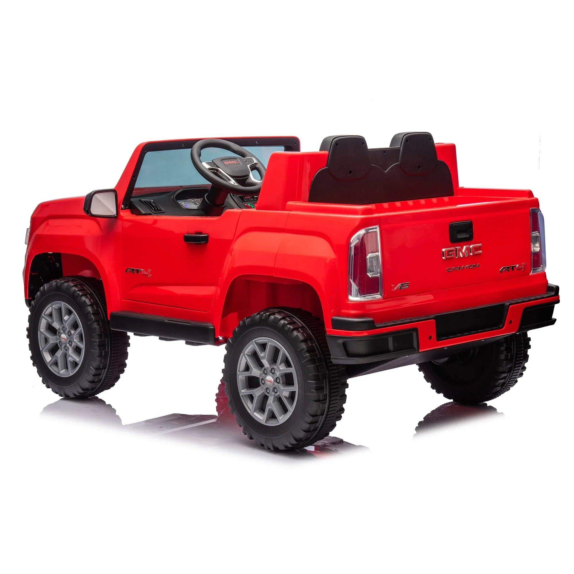 Red GMC Canyon AT4 ride-on toy truck for kids with two seats and realistic details