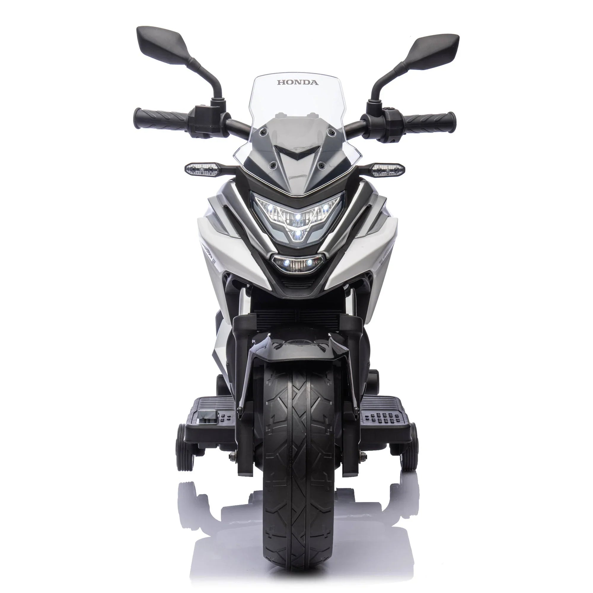 Front view of white Honda motorcycle toy with black mirrors and training wheels on white background