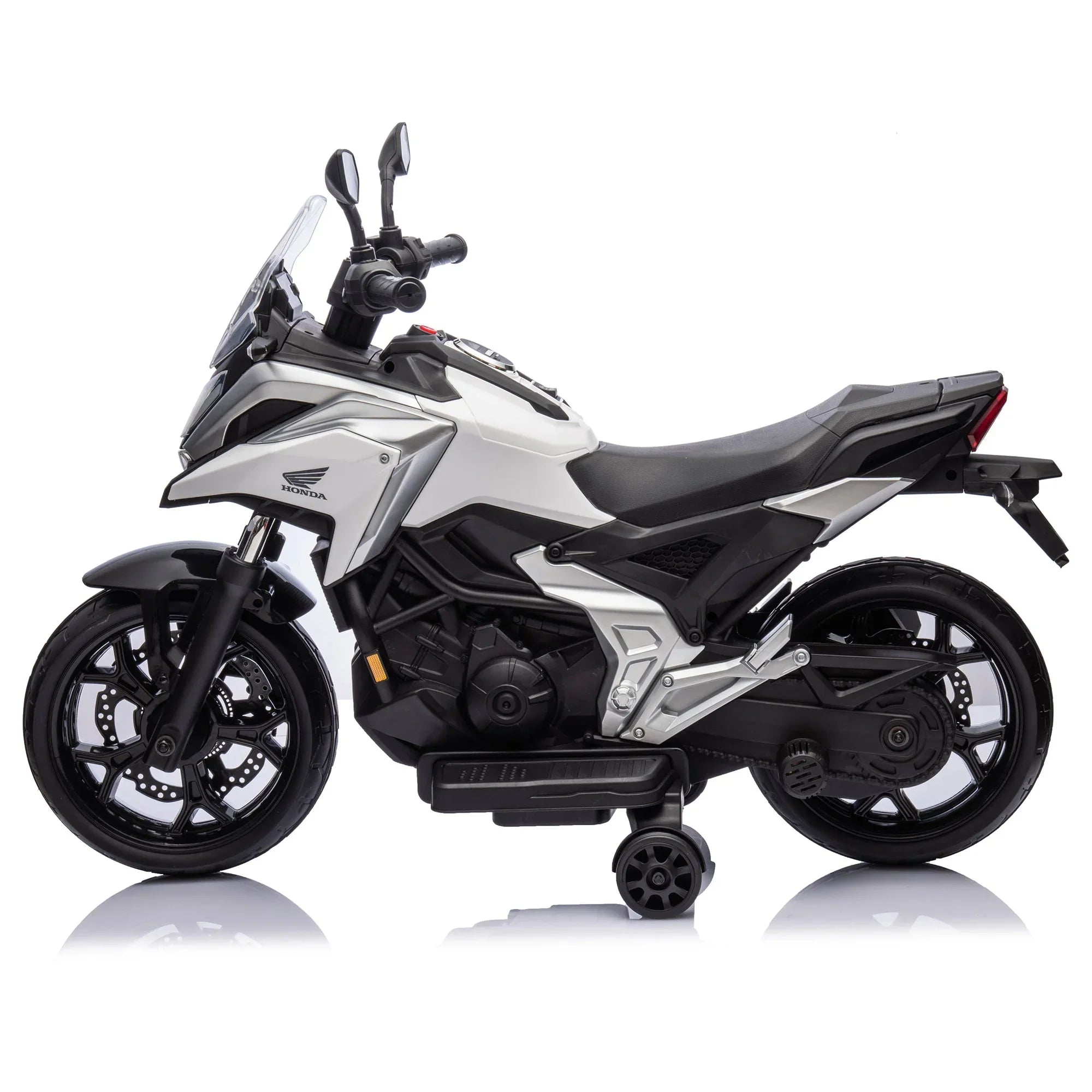 White and black Honda kids electric motorcycle toy with training wheels, studio background