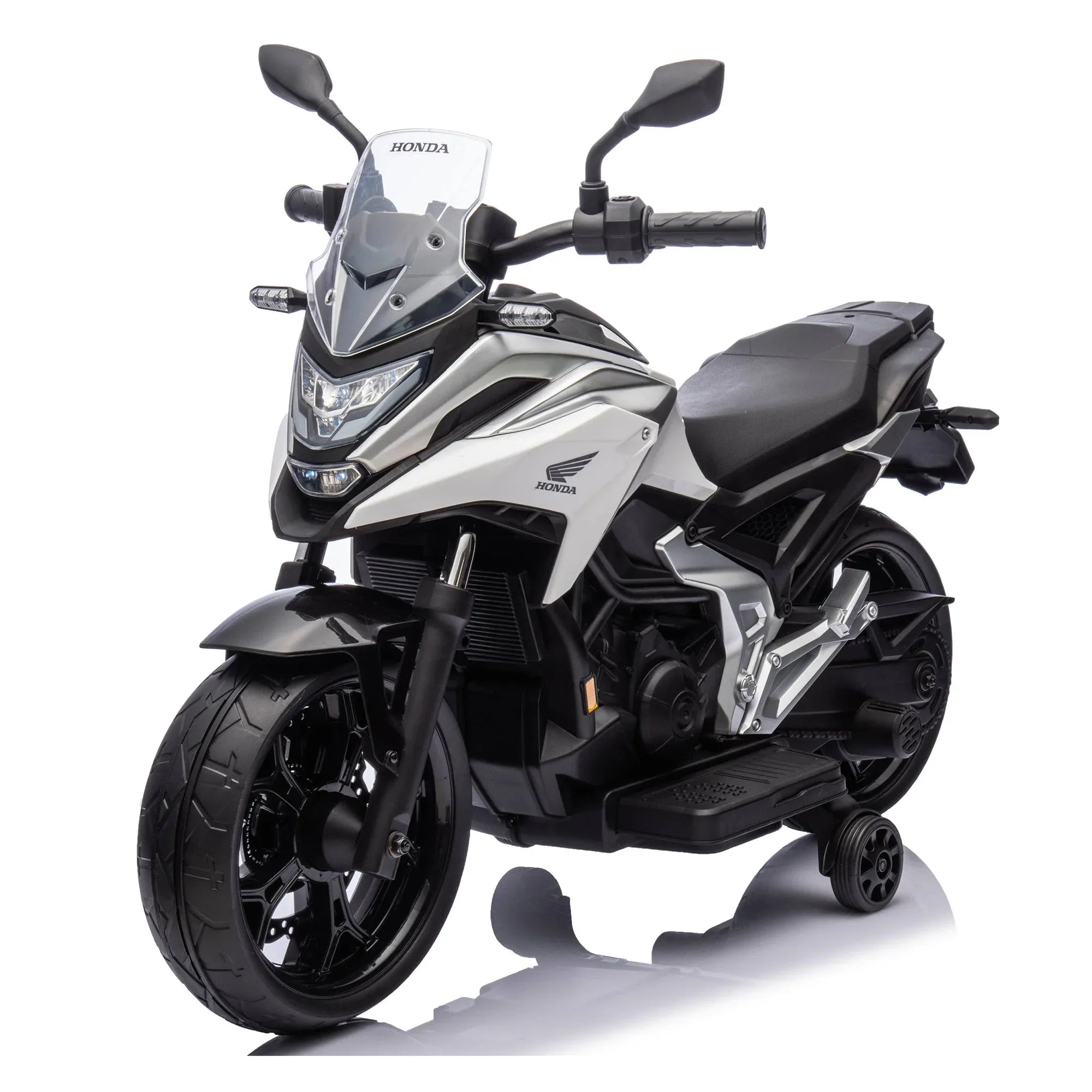 White and black Honda kids ride-on motorcycle with training wheels, studio background