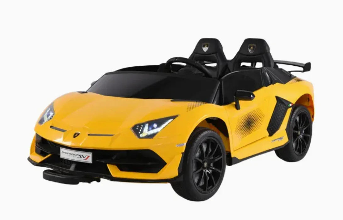 Yellow electric kids ride-on Lamborghini car with black seats and sporty wheels