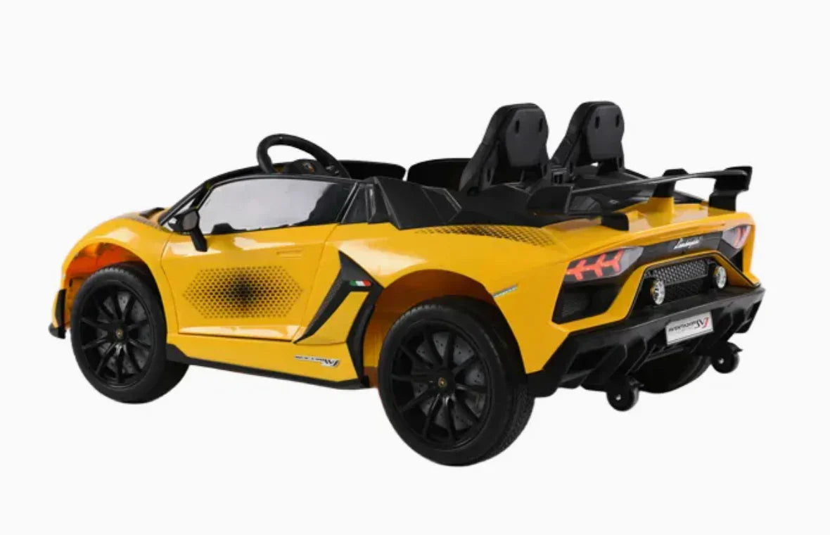 Yellow Lamborghini Aventador SV kids ride-on car with black wheels and spoiler