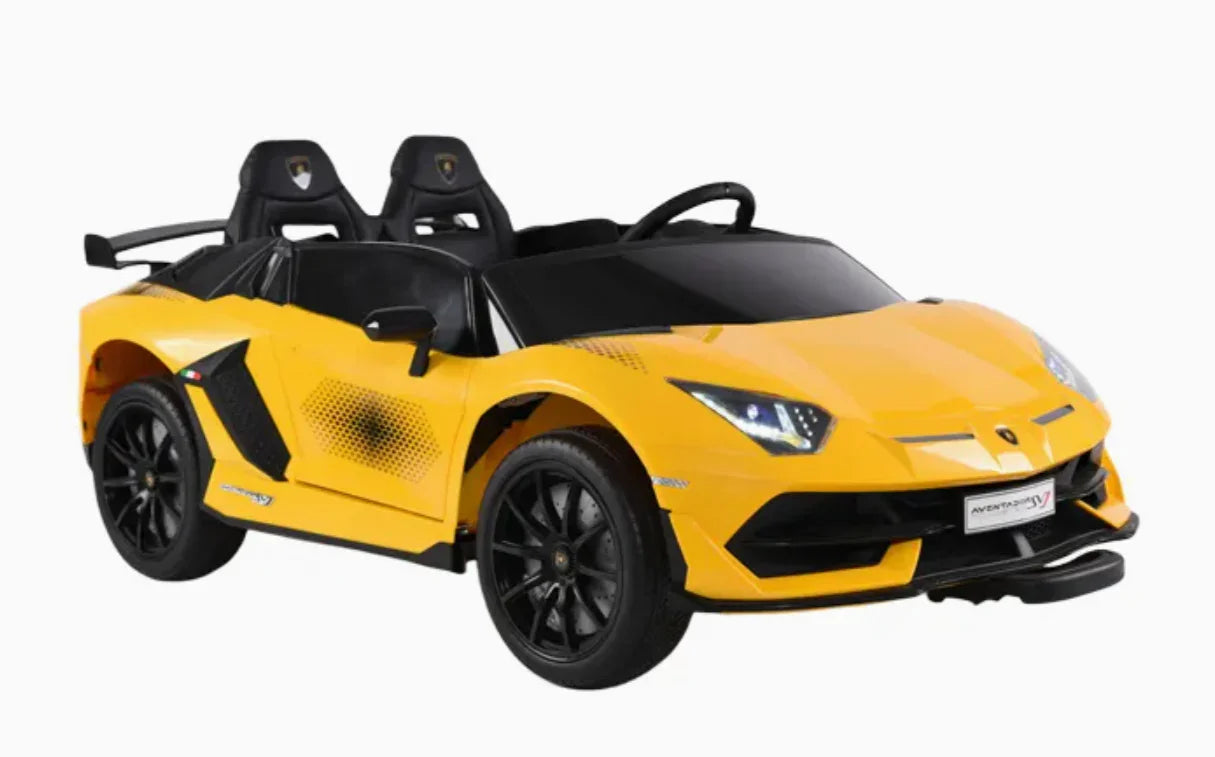 Yellow Lamborghini Aventador SVJ kids electric ride-on car with black seats on white background