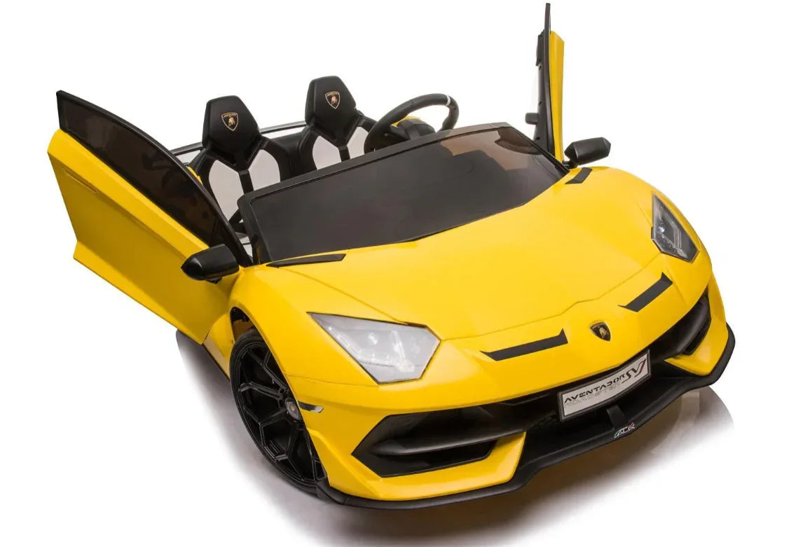 Yellow toy Lamborghini Aventador car for kids with both doors open, black interior, on white background