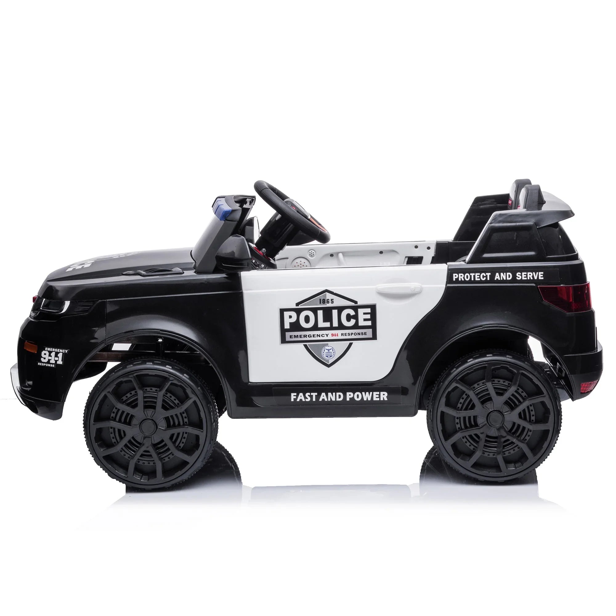 Black and white toy police car for kids with emergency 911 markings on white background