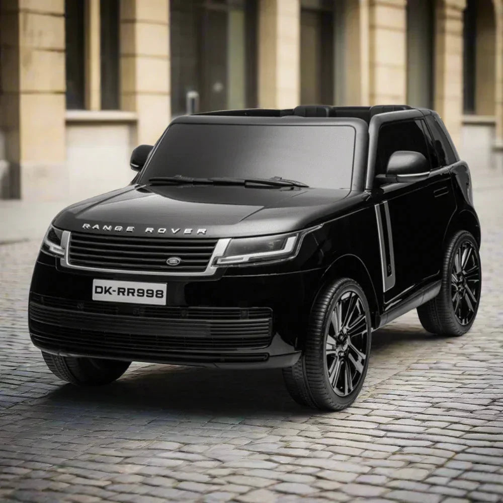 black Range Rover toy car on cobblestone street, luxury kids electric ride-on vehicle