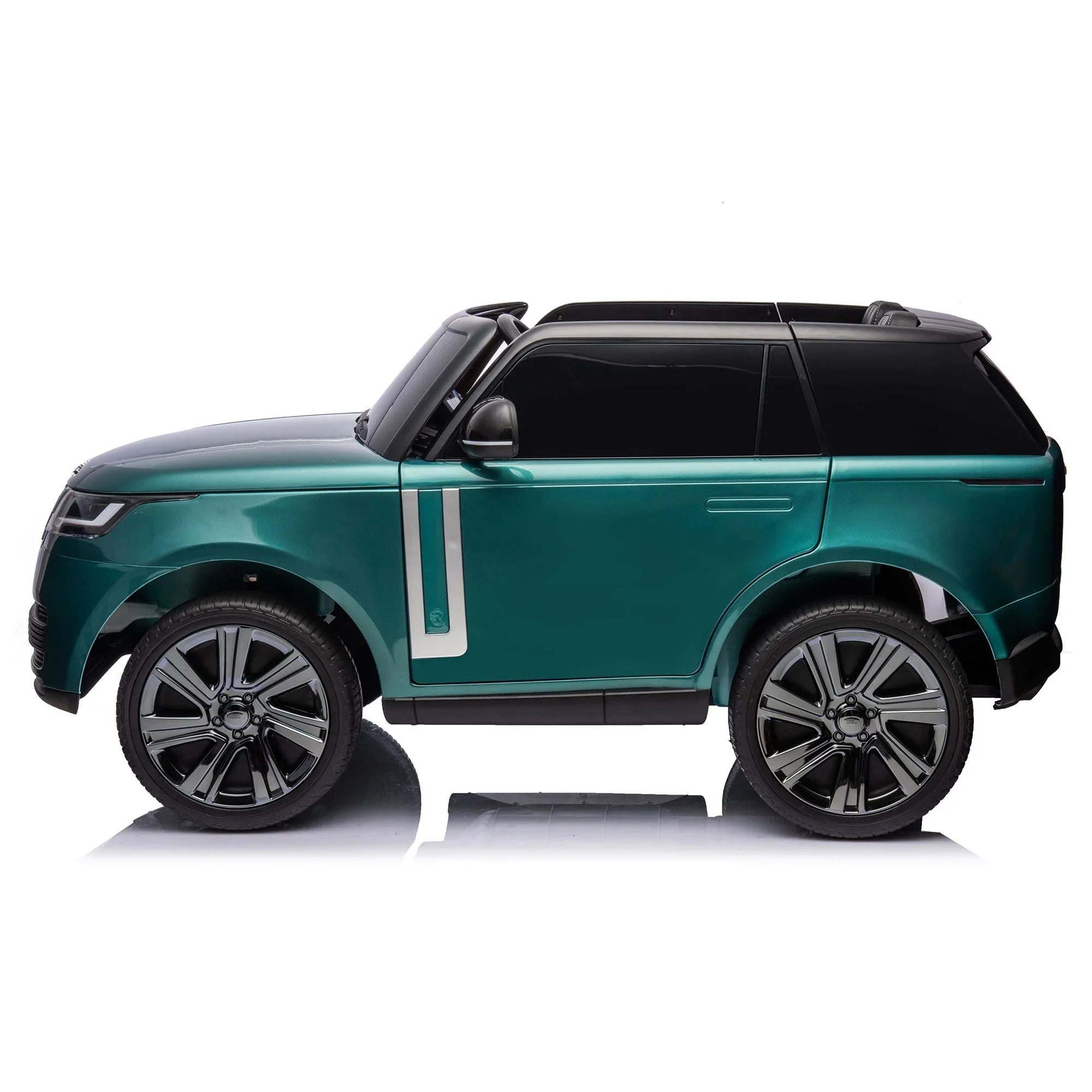 Green electric ride-on SUV toy car for kids with black roof and large wheels on white background