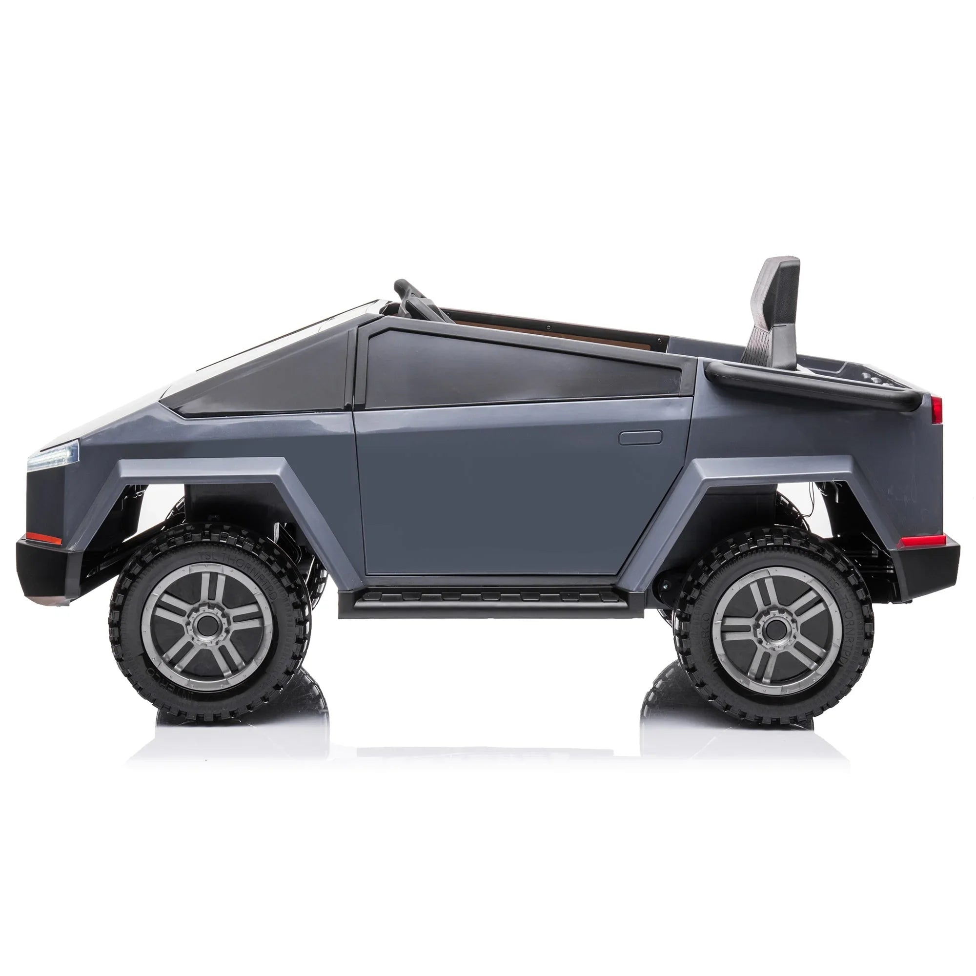 Gray toy electric truck with rugged tires and angular design on white background