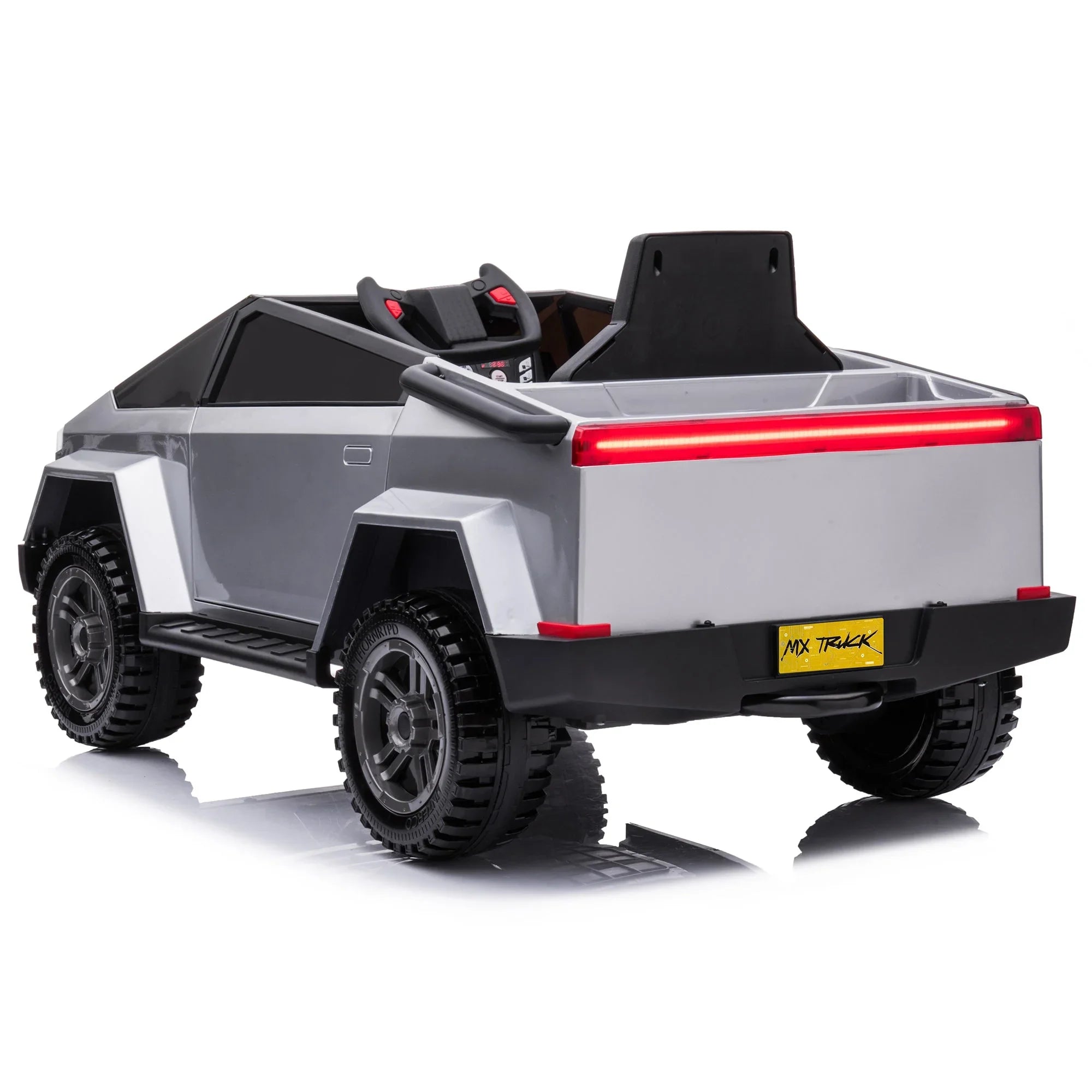 Silver toy electric truck with rugged tires and LED tail light on white background