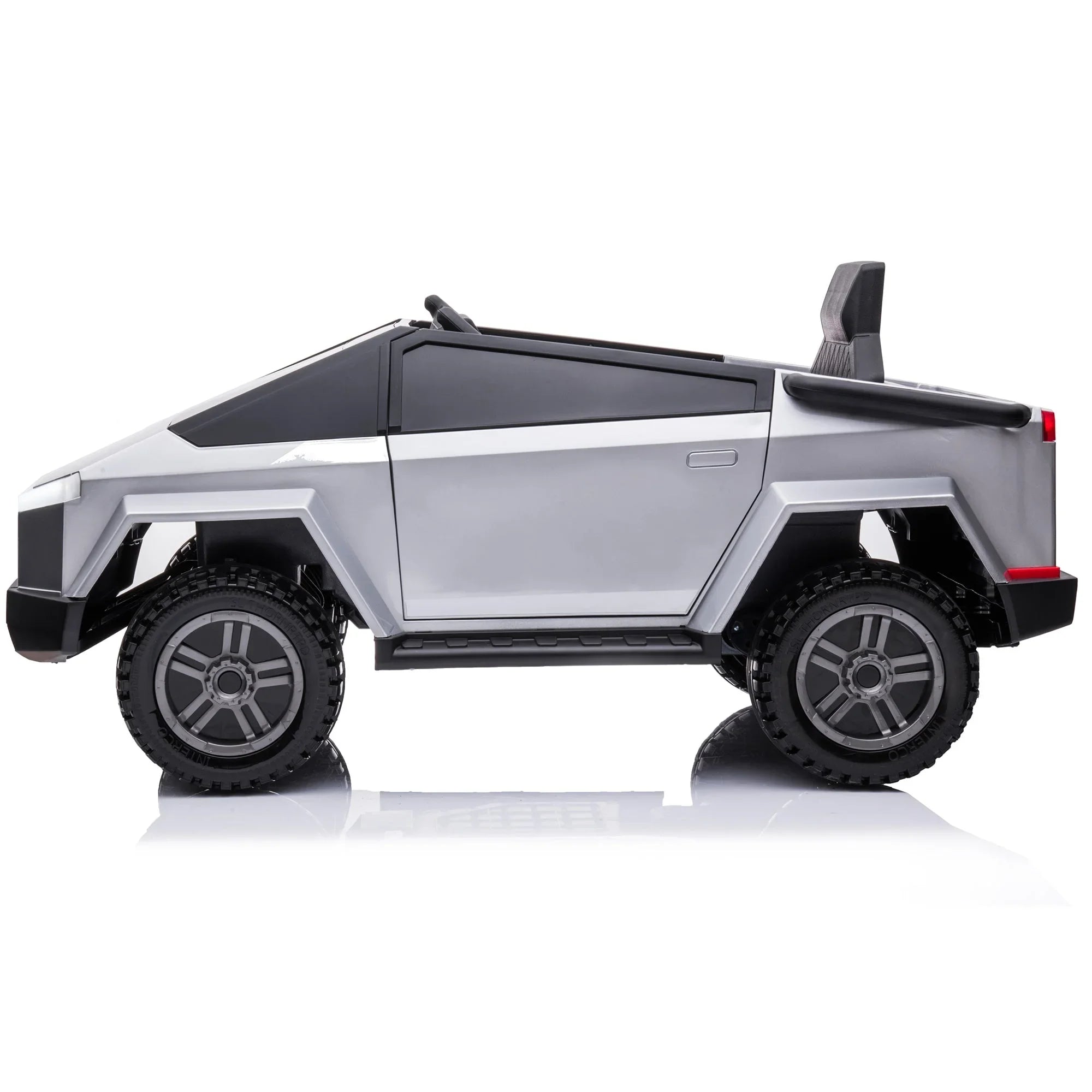 Silver toy electric truck with angular design and large black wheels on white background