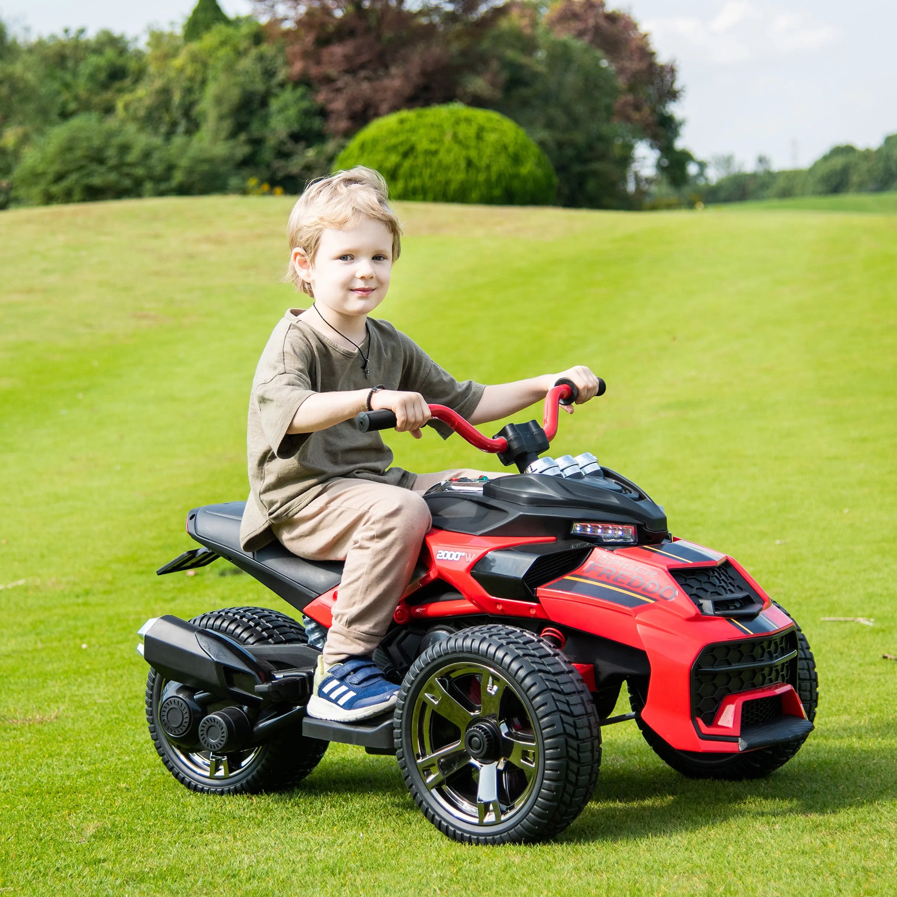 Child riding a red 3-wheel electric motorcycle on grass outdoors