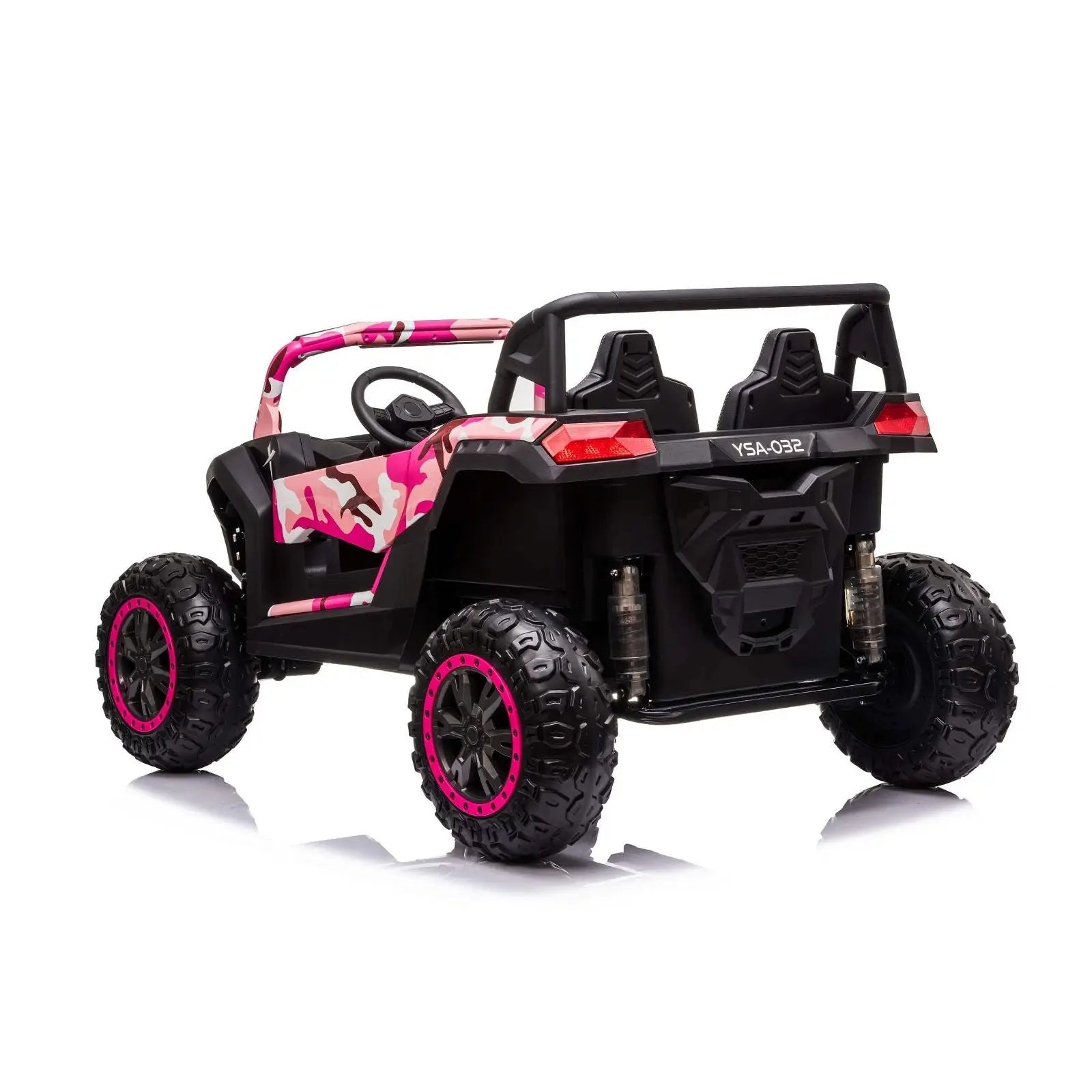 Pink camouflage 2-seater kids ride-on dune buggy with off-road tires, rear view