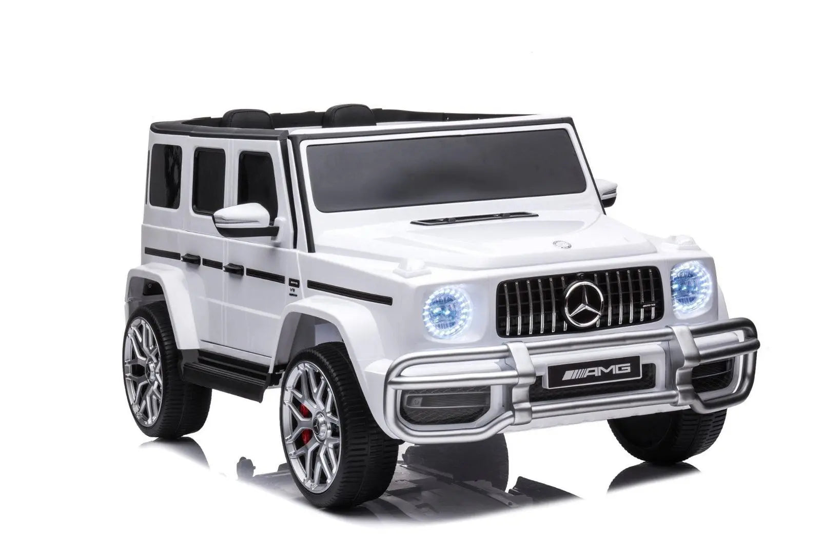 White Mercedes Benz G63 AMG kids electric ride-on car with LED headlights, isolated on white