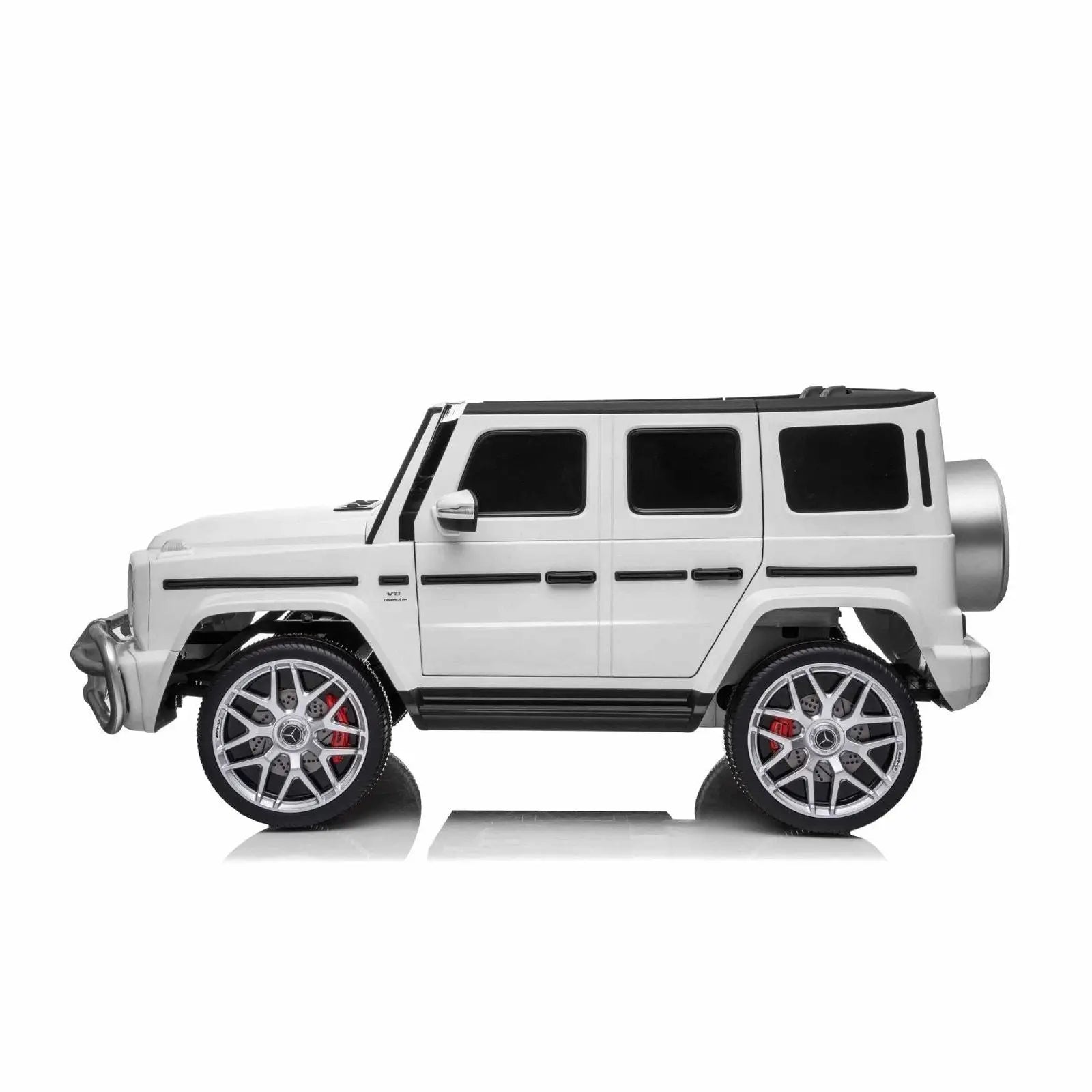 White 24V Mercedes G63 AMG kids ride-on toy car with large silver wheels, side view
