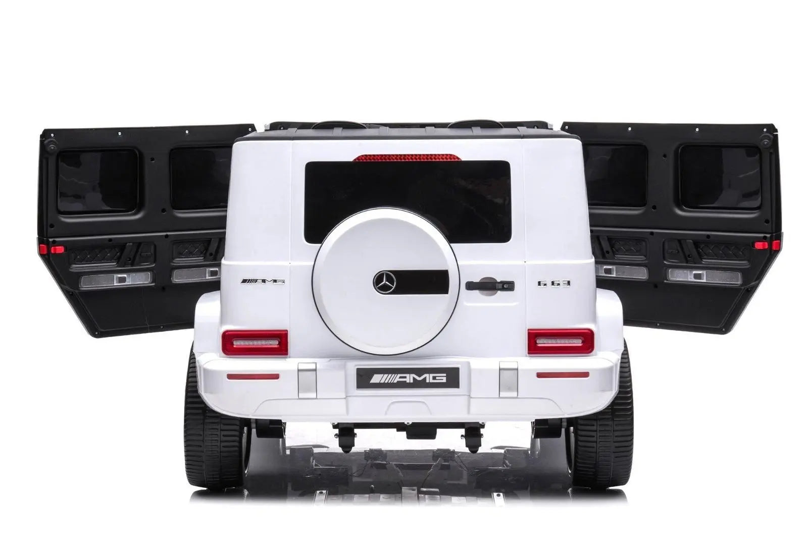 White Mercedes-Benz G63 AMG ride-on toy car with open rear doors, rear view
